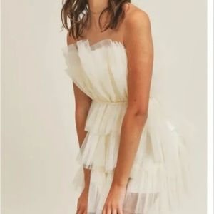 Strapless Tulle dress in cream that features a gathered waist